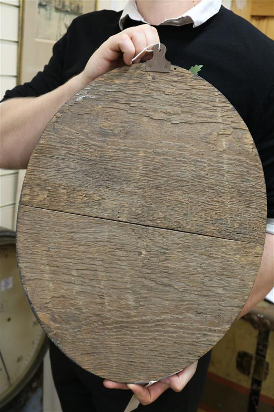 An Irish-style oval mirror W.37cm